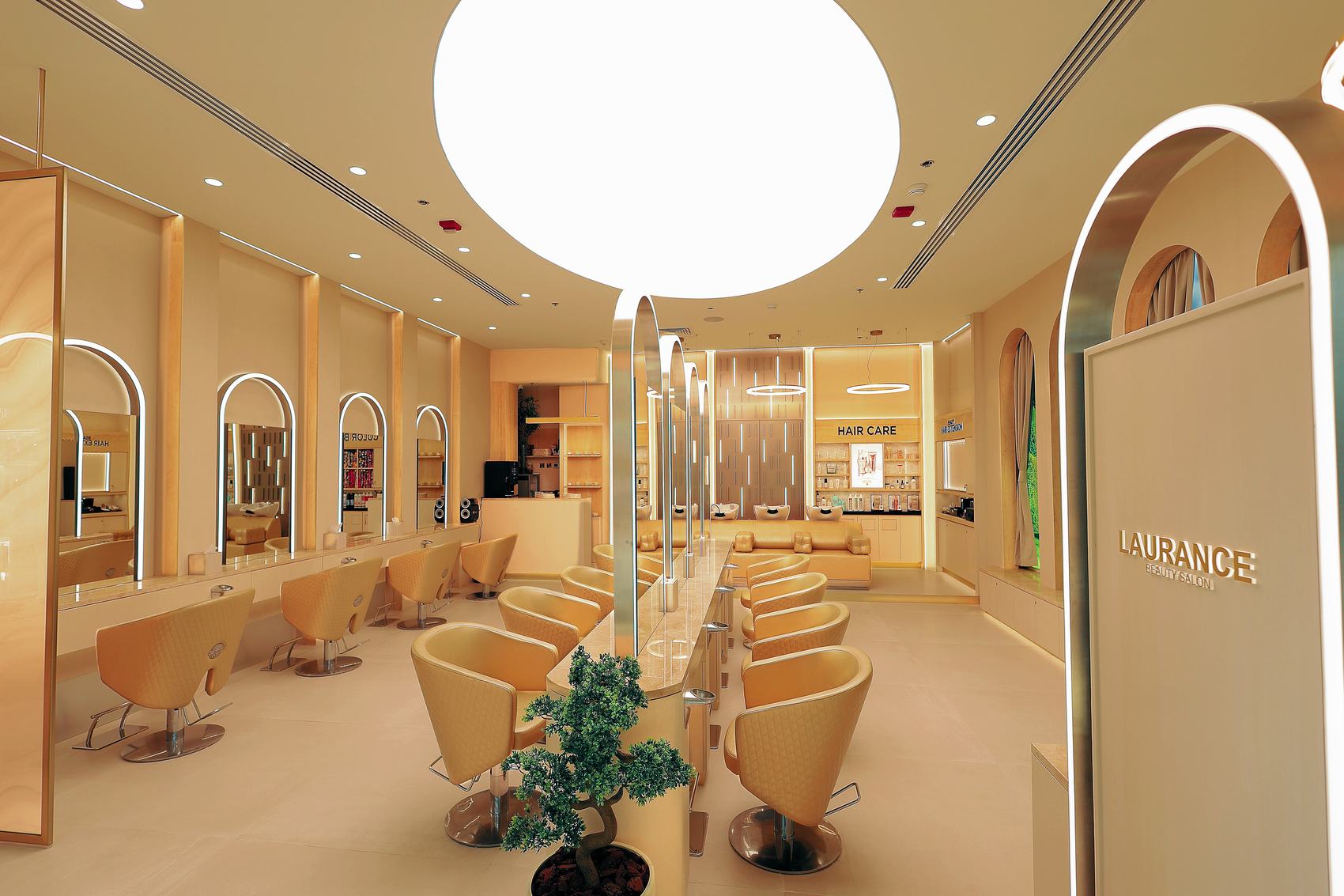 Sky-lit styling floor with Laurance signage